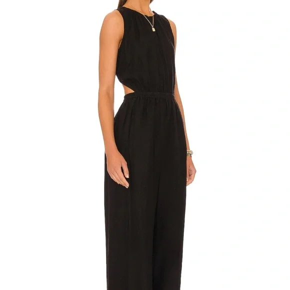Black jumpsuit! Used for a one time event,washed,cleaned and ready to go!